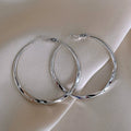 Women's Twist Metal Hoop Earrings